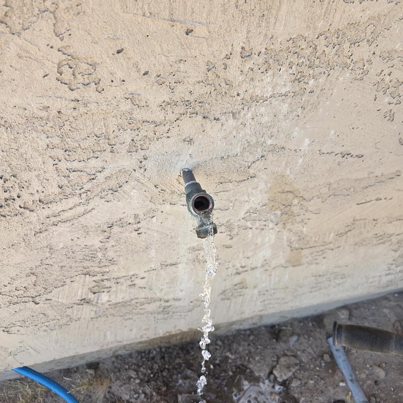 Backyard hose bib leaking water from pipe connection Backyard hose bib leaking water from pipe connection