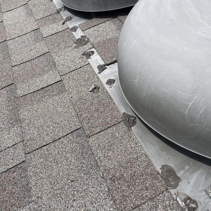 Turbine roof vent flashing with sealant repairs