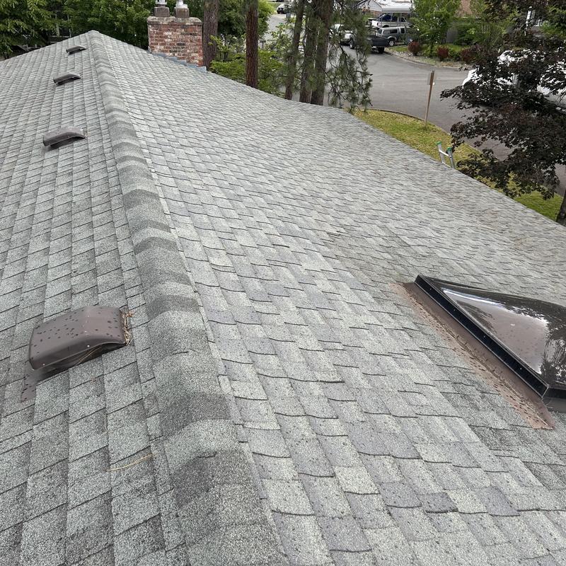 Asphalt shingle roof with vents and skylight inspection Asphalt shingle roof with vents and skylight inspection