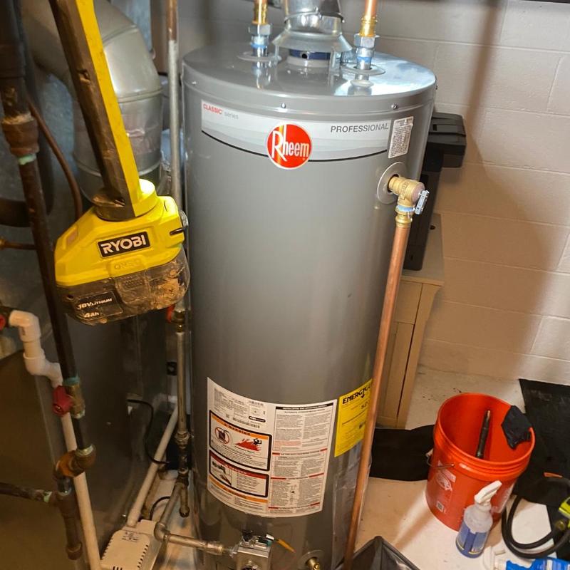 40-gal Rheem water heater with copper vent piping