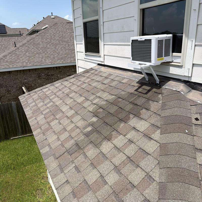 Window air conditioner with roof shingle flashing