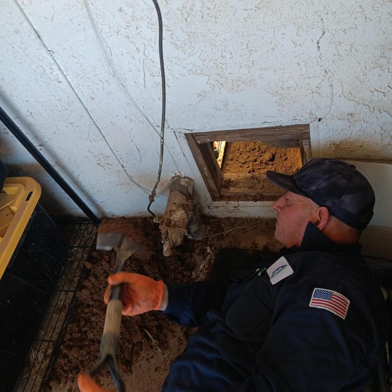 Bathtub waste and overflow plumbing under slab flooring