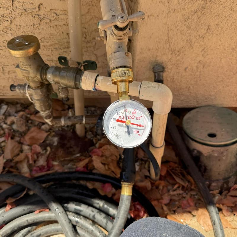 Pressure vacuum breaker with pressure gauge and hose bib