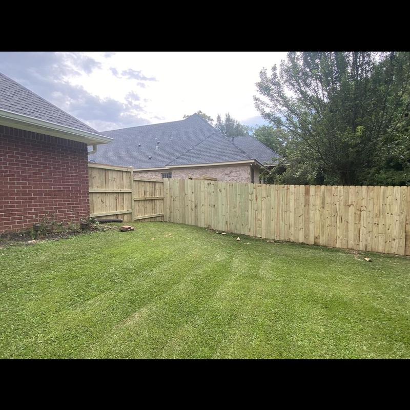Wooden privacy fence installed in backyard, Brandon MS