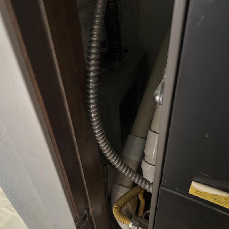 Gas furnace gas line with electrical conduit installation Gas furnace gas line with electrical conduit installation