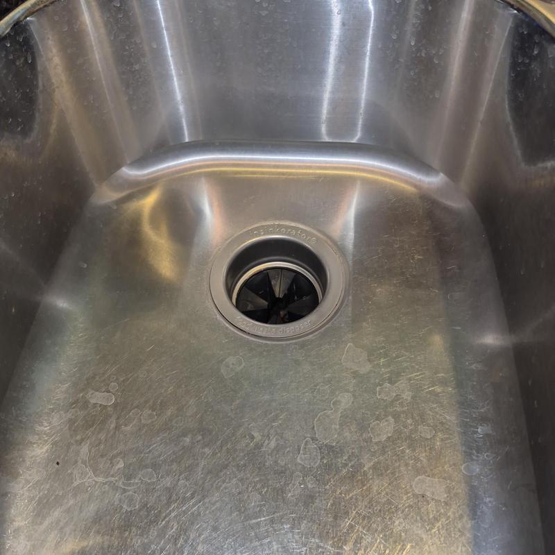 12 hp garbage disposal in stainless steel sink basin