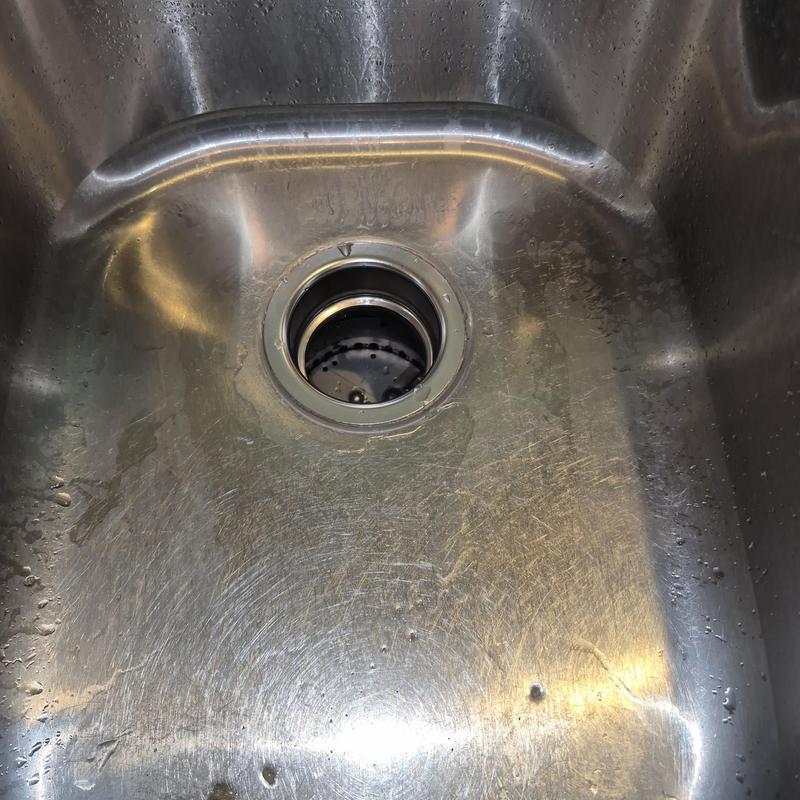 12 hp garbage disposal installed in stainless steel sink