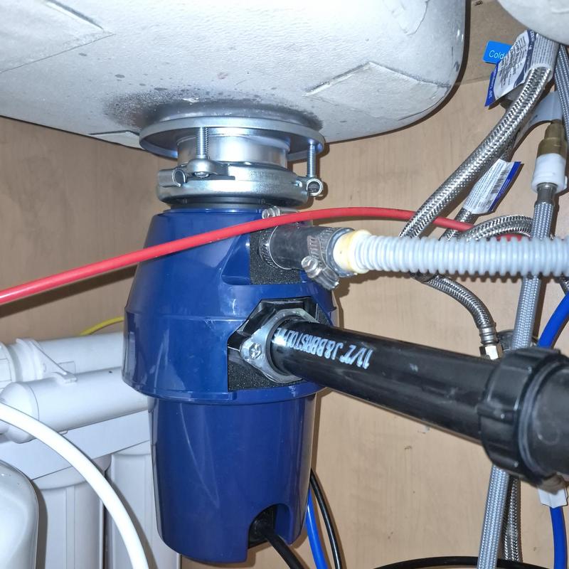 12 hp garbage disposal with attached plumbing lines