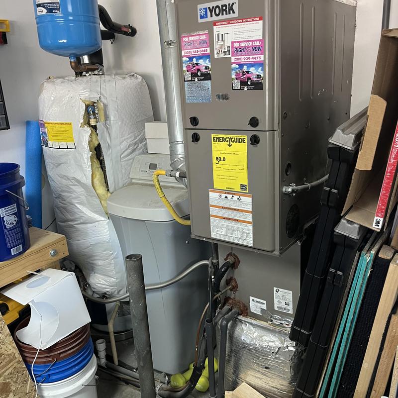 HVAC furnace and water softener setup in utility room HVAC furnace and water softener setup in utility room