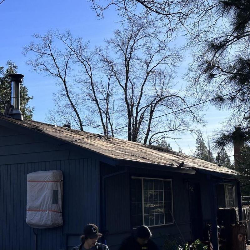 Gaf lifetime asphalt roof and steel gutters on cabin