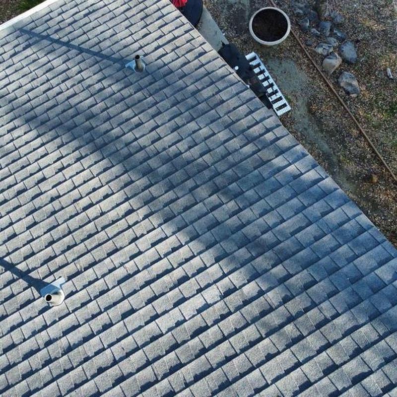 Vent pipe flashings on gray shingle roof in Sonora, CA