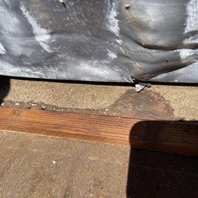 Tile roof flashing with rust stain in Sonora, CA Tile roof flashing with rust stain in Sonora, CA