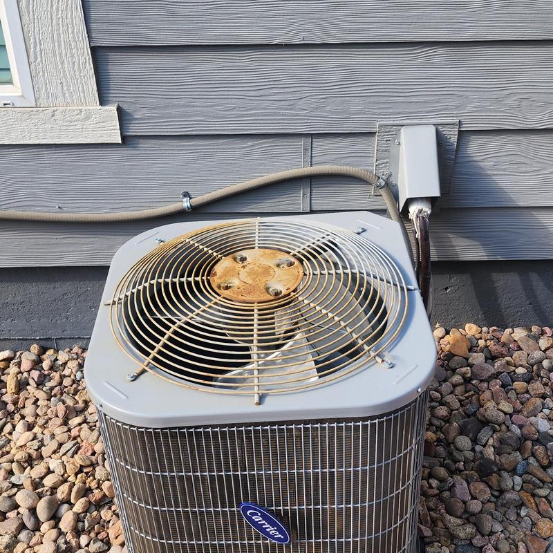 Carrier CA13NA air conditioner outdoor unit with rusted fan