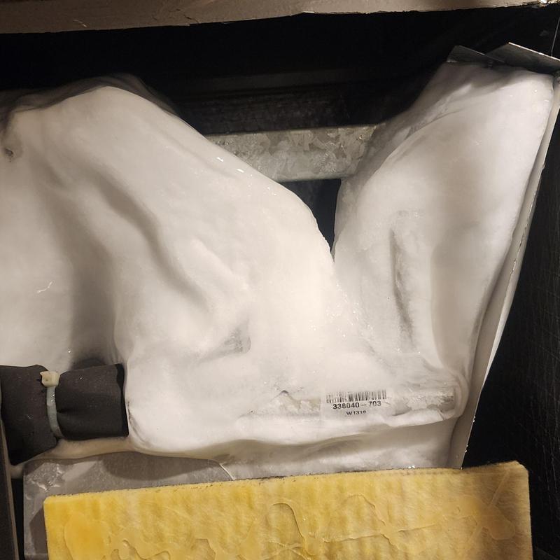 Frozen indoor coil with ice buildup and dirty filter