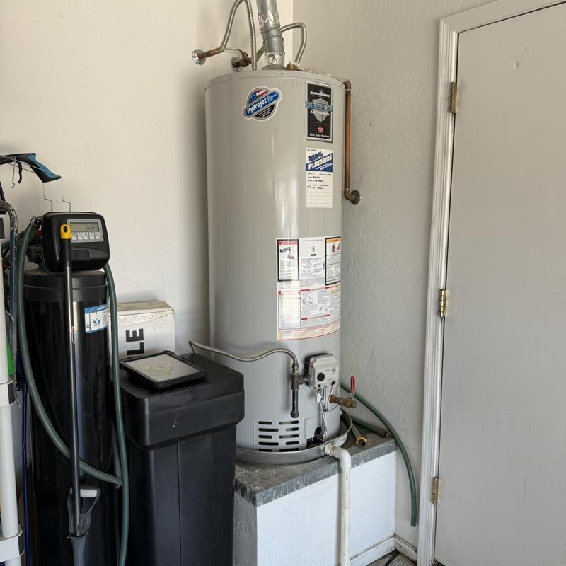Water heater replacement with connected water softener system
