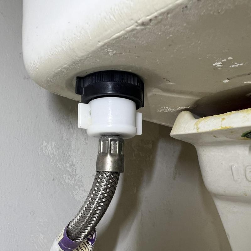 Toilet fill valve connection with braided supply line