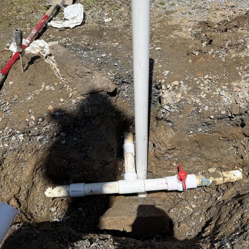 2-inch PVC water main with shutoff valve in trench 2-inch PVC water main with shutoff valve in trench