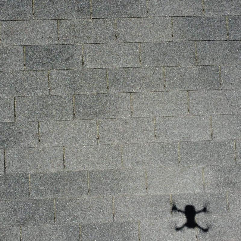 Asphalt roof shingles with no hail damage visible