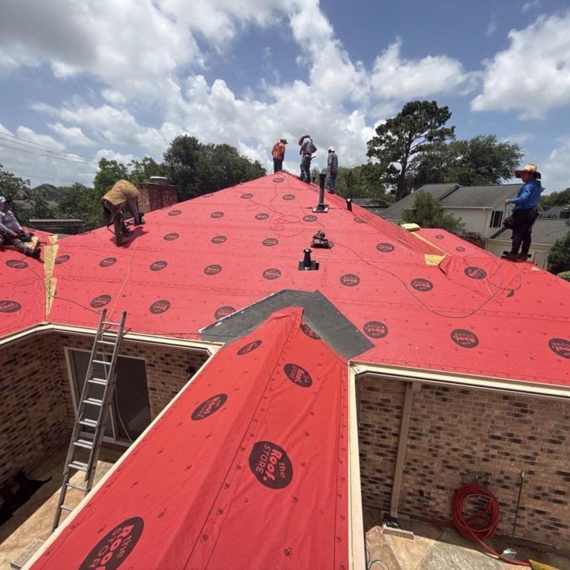 ClimateFlex roofing underlayment installation on house roof