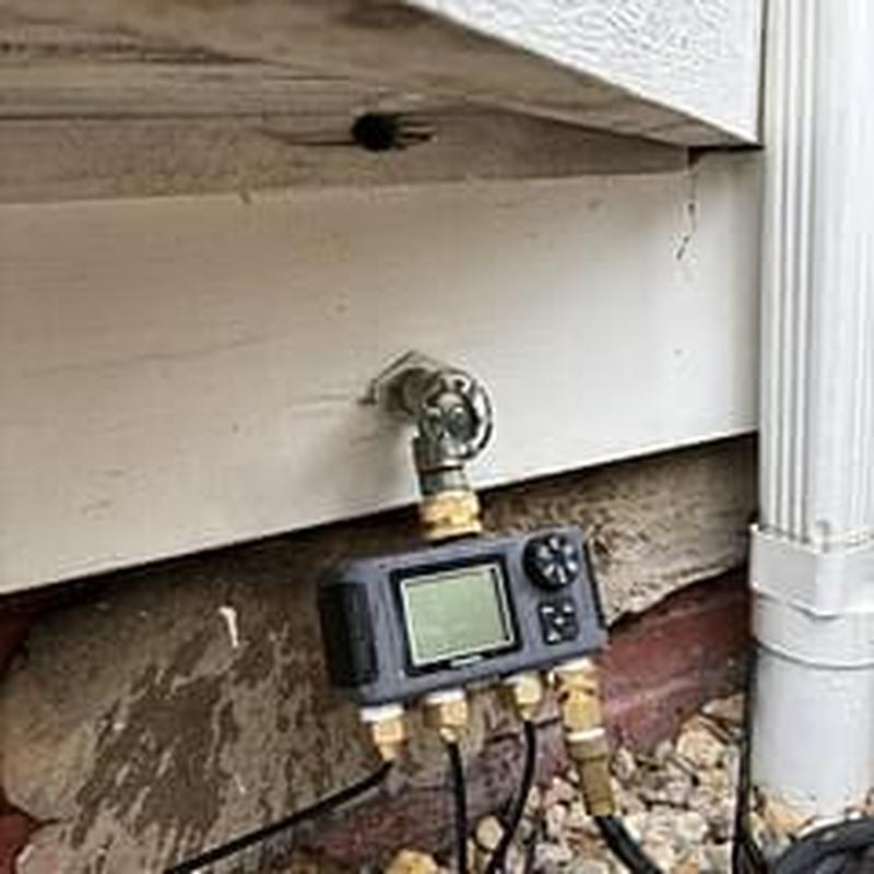 Hose bib with water timer and outdoor plumbing connections