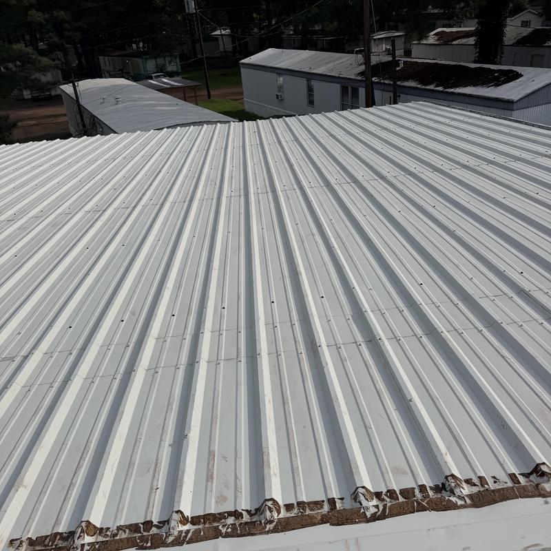 Metal roof panels cleaned with pressure wash