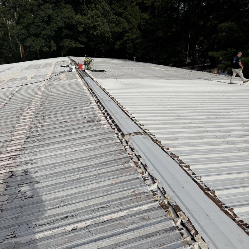 Metal roof pressure washing and chemical cleaning