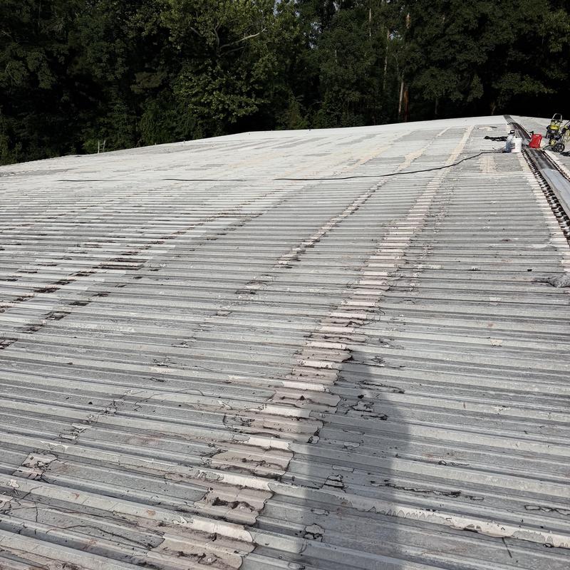Metal roof pressure washed for silicone roof prep