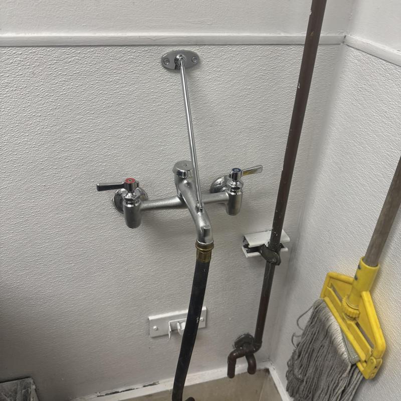 Chicago style mop sink faucet with mop and pipes