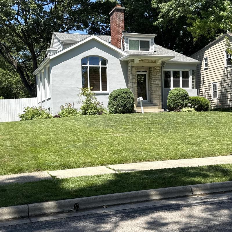Asphalt shingle roof and gutters inspection on house