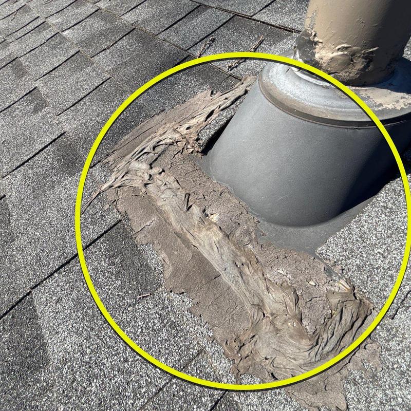 Roof vent flashing with deteriorated sealant on shingles