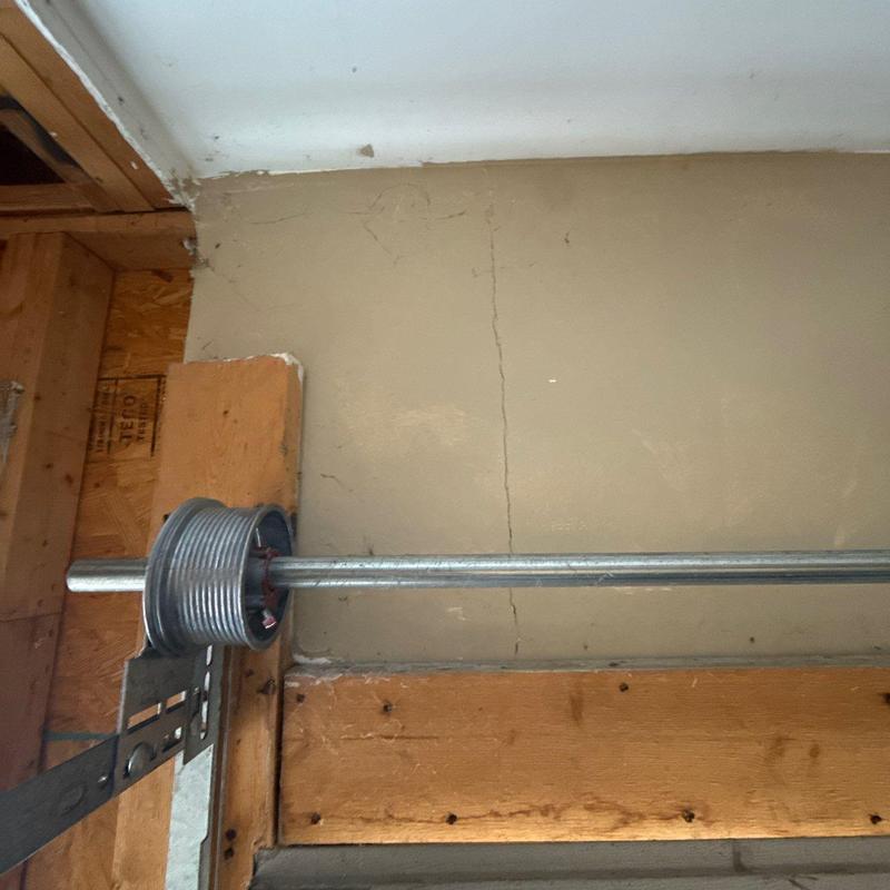 Garage door torsion spring and shaft installation detail