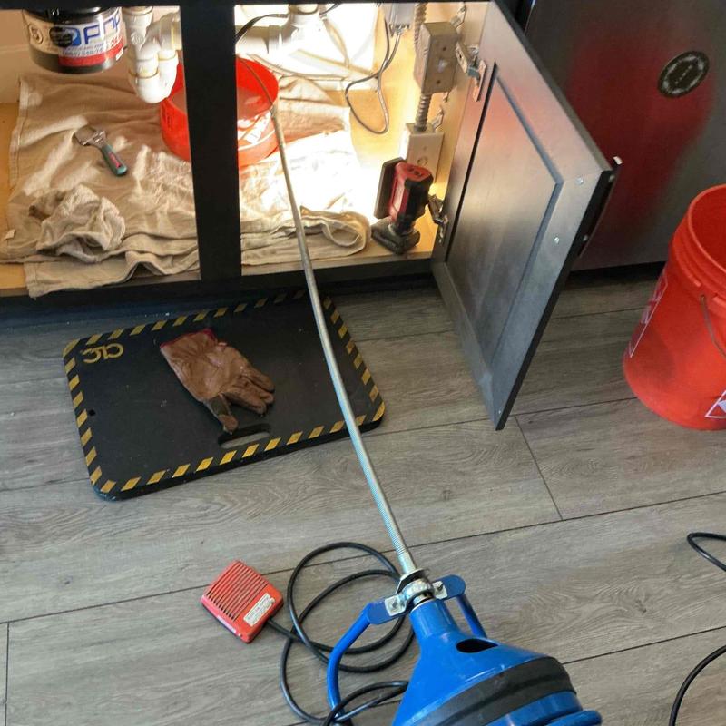 Kitchen branch drain line with professional cleaning tool