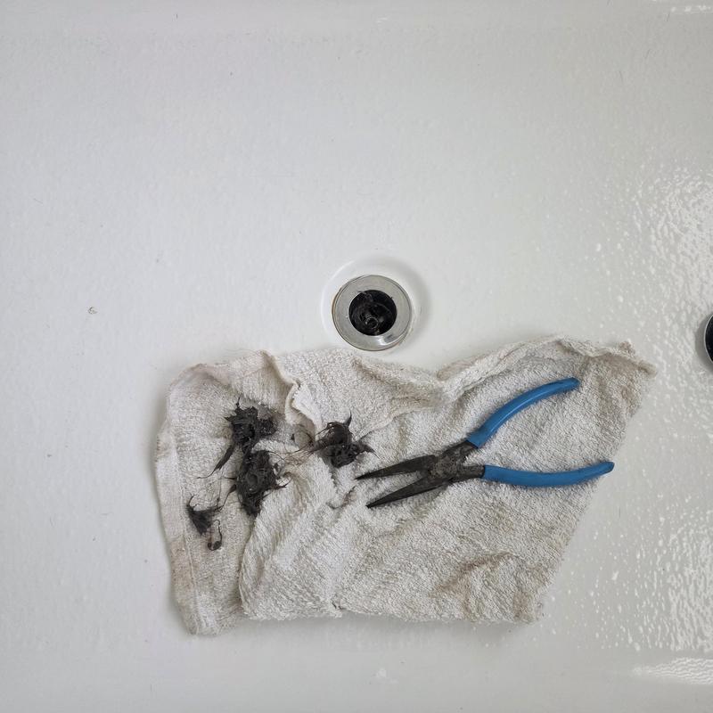 Freestanding tub drain clog cleared, hair removed Freestanding tub drain clog cleared, hair removed