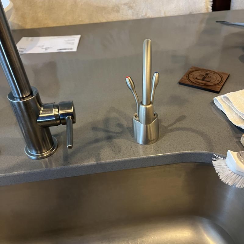 Reverse osmosis system faucet on kitchen countertop