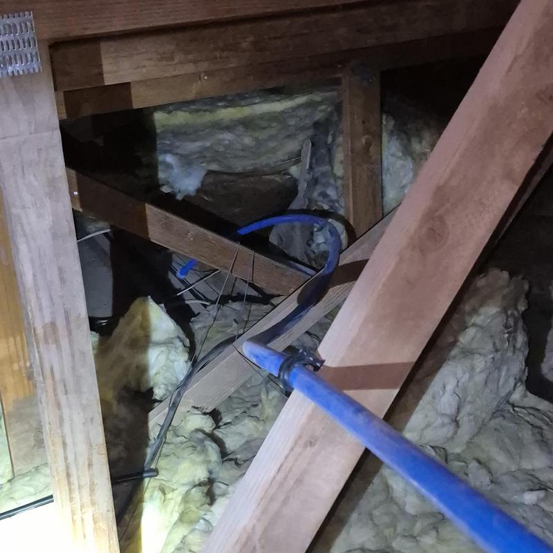Pex water line installation in attic with insulation