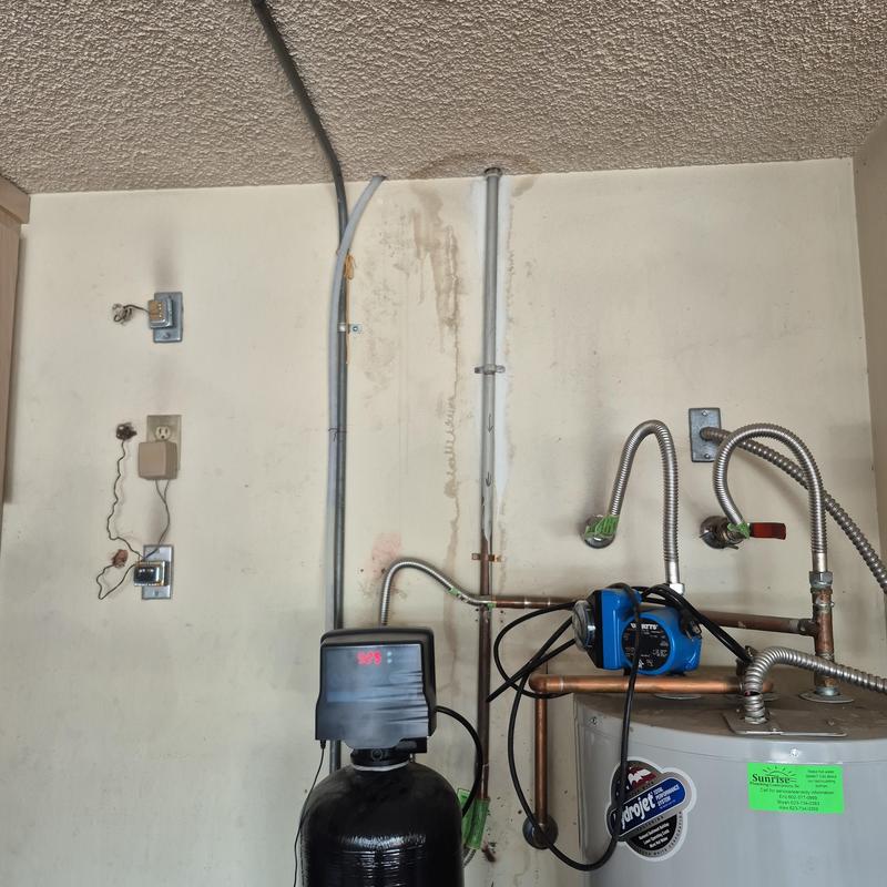 Water heater plumbing with PEX water line installation