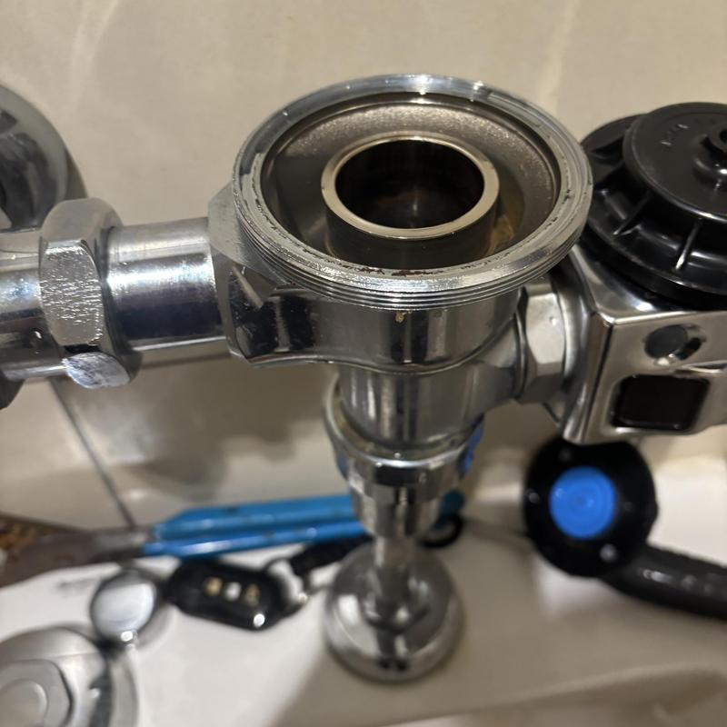Sloan Royal flush valve disassembled for replacement