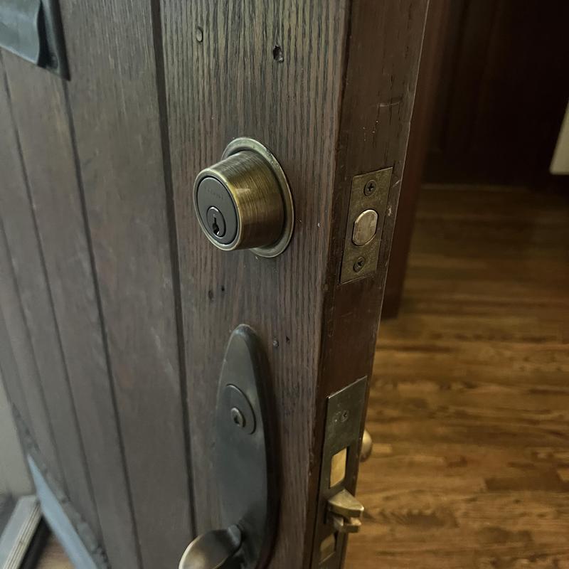 Door deadbolt and handle lock rekeying in wooden door