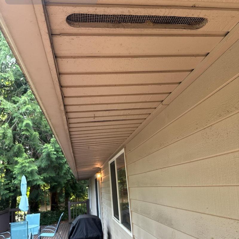 Soffit vent with screen on exterior house deck