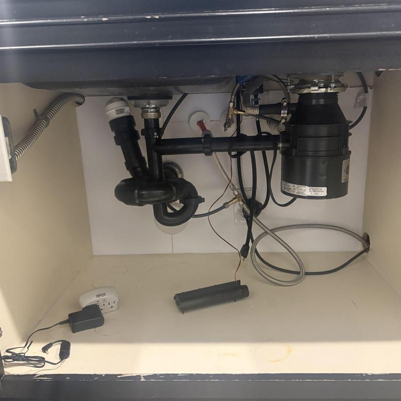 12 hp garbage disposal with drain pipes under sink