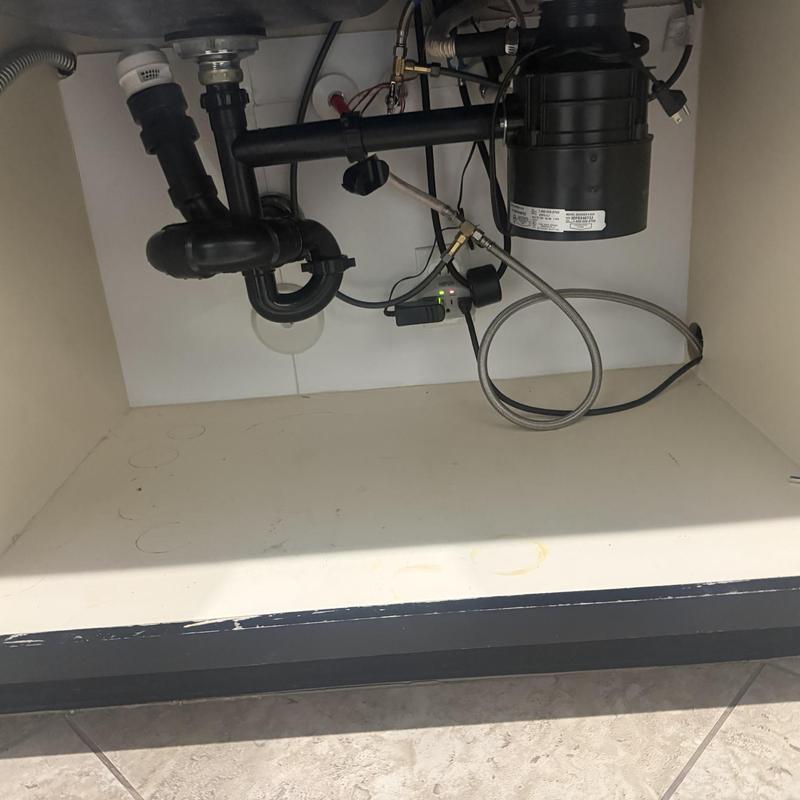 12 hp garbage disposal and under-sink plumbing setup