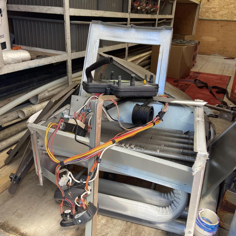Heat exchanger unit removed from furnace system