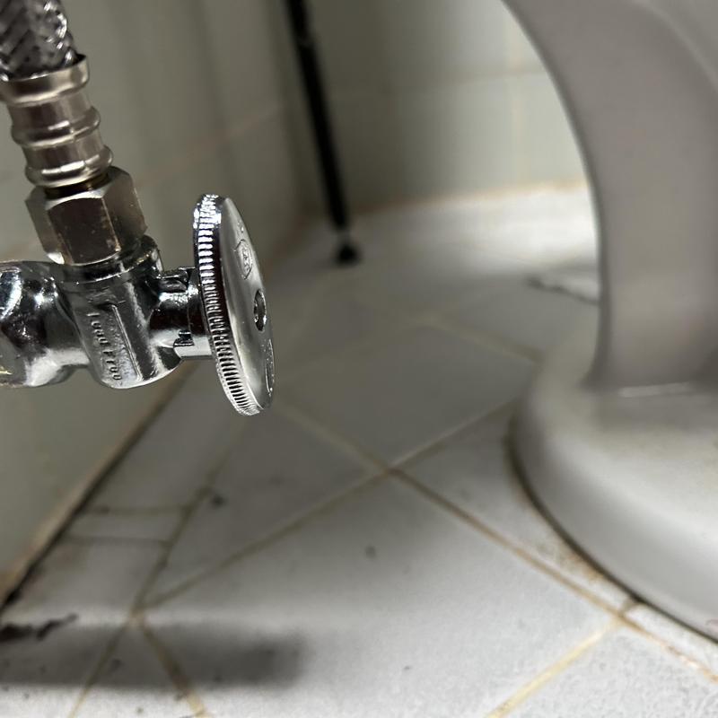 Toilet angle stop valve and supply hose installation