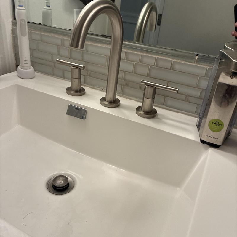 Widespread bathroom faucet and sink installation
