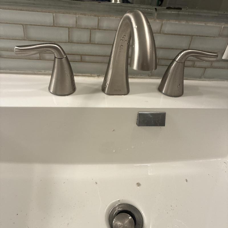 Widespread bathroom faucet with brushed nickel finish