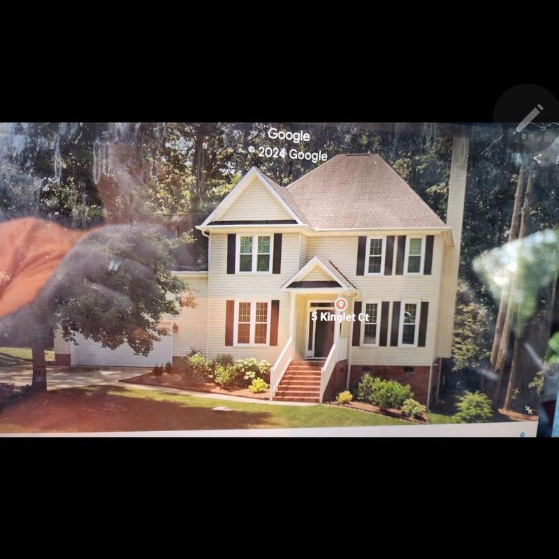 Owens Corning architectural shingle roof on two-story house