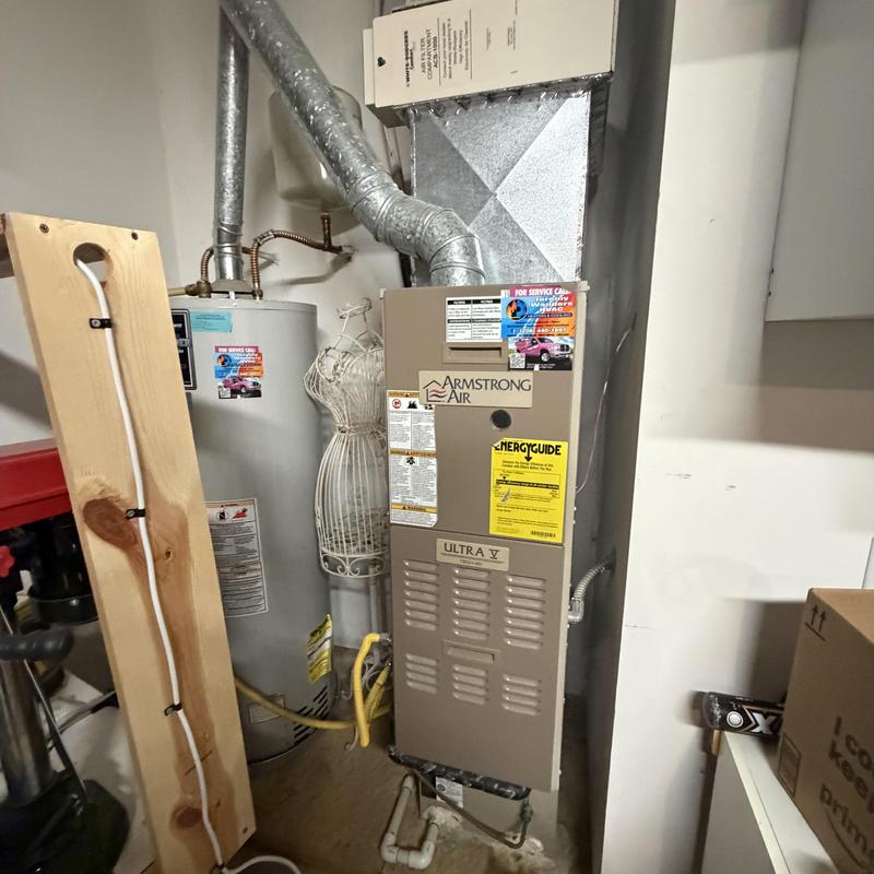 Armstrong Air furnace and water heater in utility room Armstrong Air furnace and water heater in utility room
