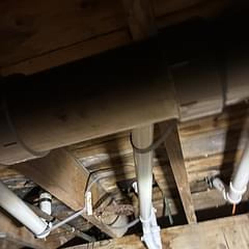 Tub waste and drain pipes in crawlspace installation
