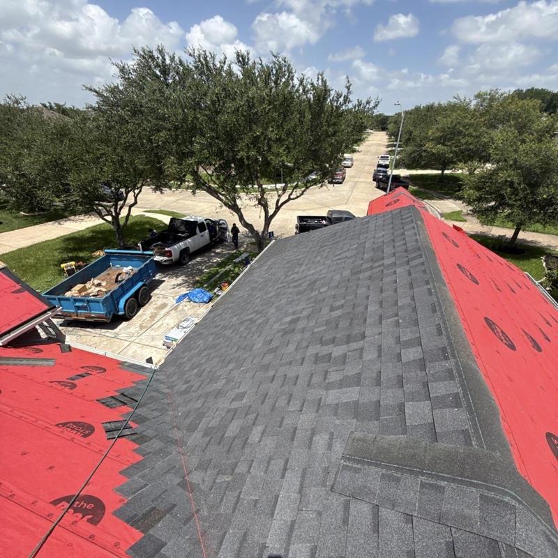 CertainTeed ClimateFlex shingles half-installed on roof