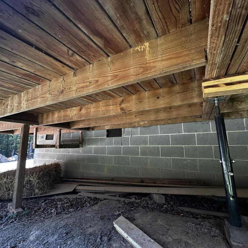 Porch wooden joists and support post system under deck